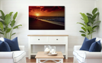 Sunset Favourite displayed above a fireplace in a bright living room. Peter Crawford Archive.