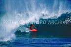 Rory Russell surfing Pipeline in Hawaii in 1978, photographed by Peter Crawford.
