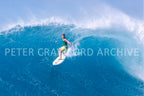 Kong surfing Sunset Beach in Hawaii in 1987–88, photographed by Peter Crawford.