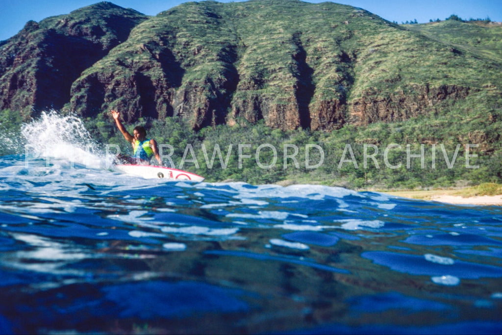 Dane Kealoha surfing on the west side of Oahu, photographed by Peter Crawford.
