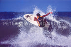 Dane Kealoha surfing Off The Wall in Hawaii in 1977, photographed by Peter Crawford.