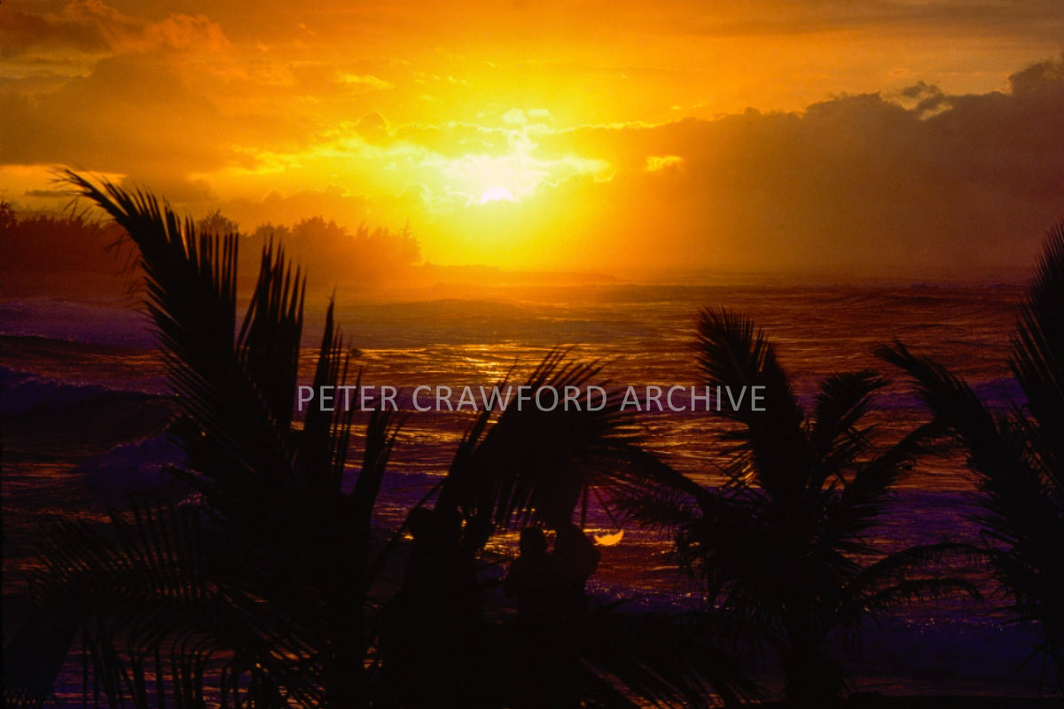 North Shore sunset in Hawaii, photographed by Peter Crawford.