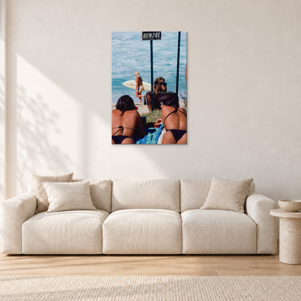 Beware Girls, 1985 by Peter Crawford — 60 × 90 cm aluminium-mounted resin print, frameless in a light minimalist living room.