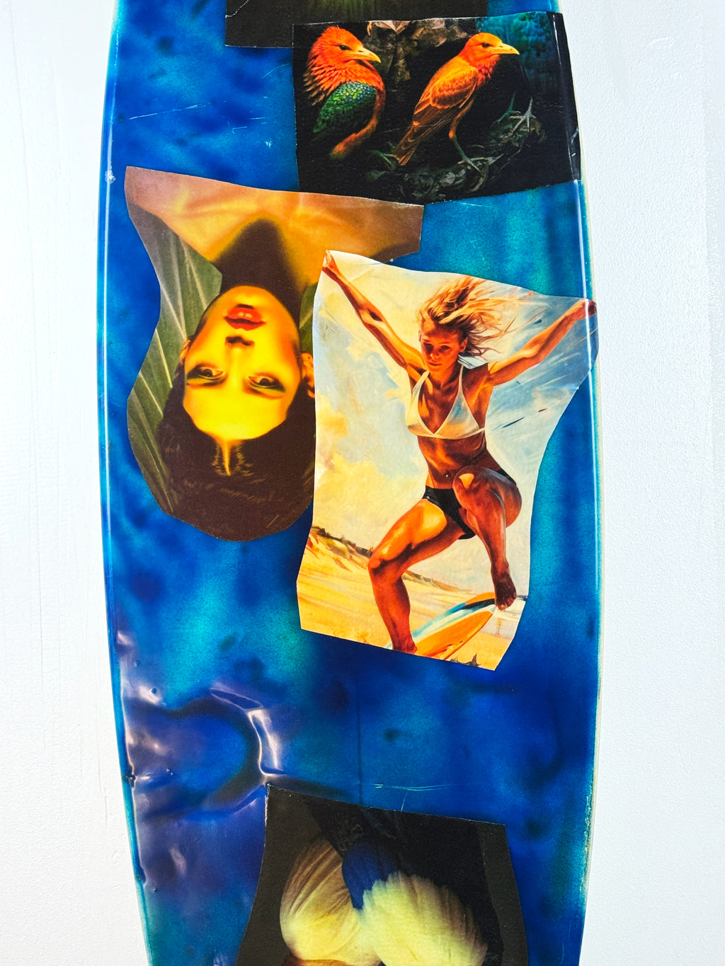 What I am Now Surfboard by David Bromley — central figurative collage detail.