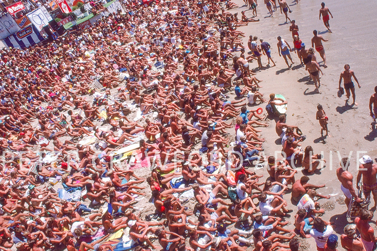A crowd scene from the OP Pro, capturing the atmosphere surrounding professional surfing. Peter Crawford Archive.