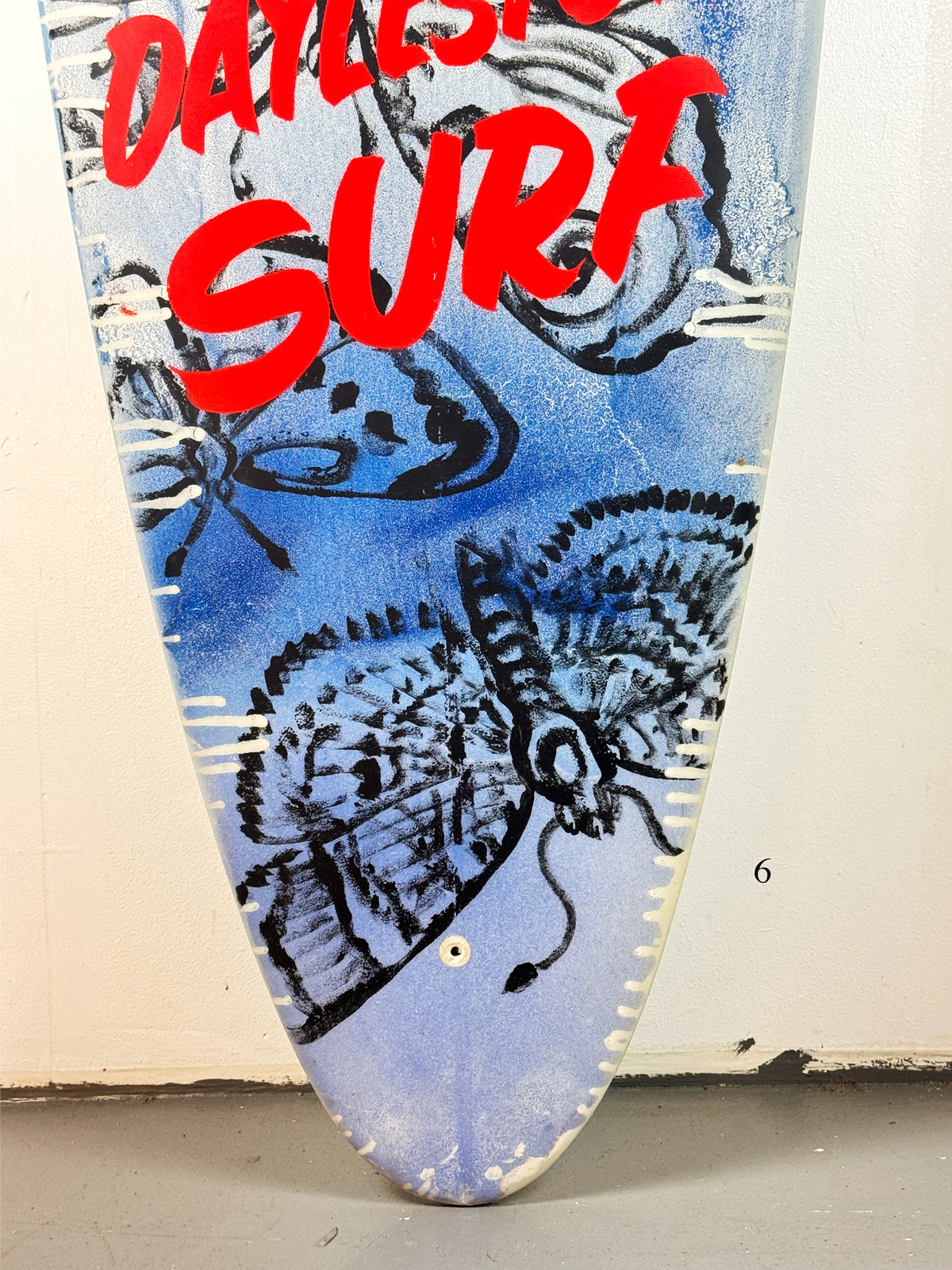 Daylesford Surf Surfboard by David Bromley — lower red lettering detail.