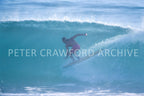 Russell L surfing, photographed by Peter Crawford.