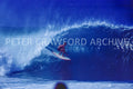 Surfer at Pipeline in Hawaii, photographed by Peter Crawford.