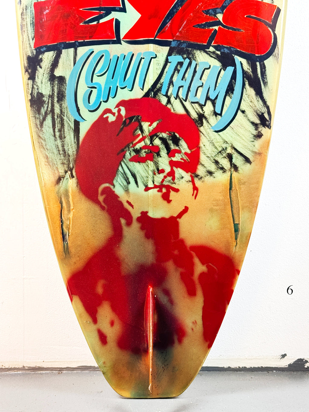 Queens Surfboard by David Bromley — lower red lettering and portrait detail.