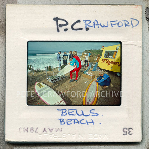 Vintage slide of a beach scene with surfers and a van, labeled 'P.C. Rawford Bells Beach'.