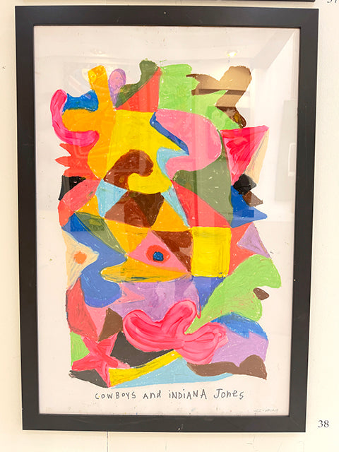 Cowboys And Indiana Jones by Ozzie Wright: interlocking colourful abstract shapes in a black frame — gallery view.
