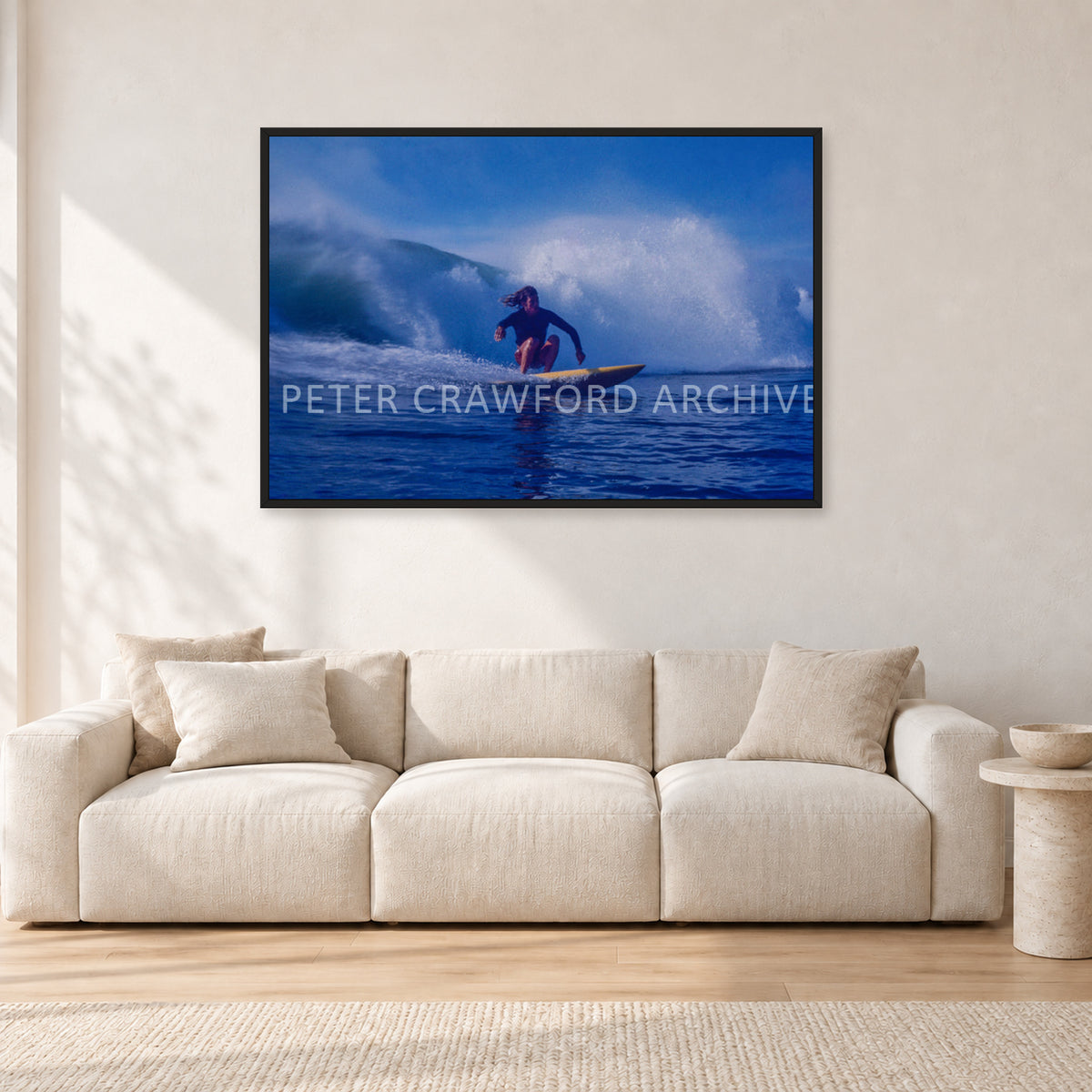 Angourie Point, Yamba 1976 by Peter Crawford — 120 × 80 cm, black frame, shown in a light minimalist living room.