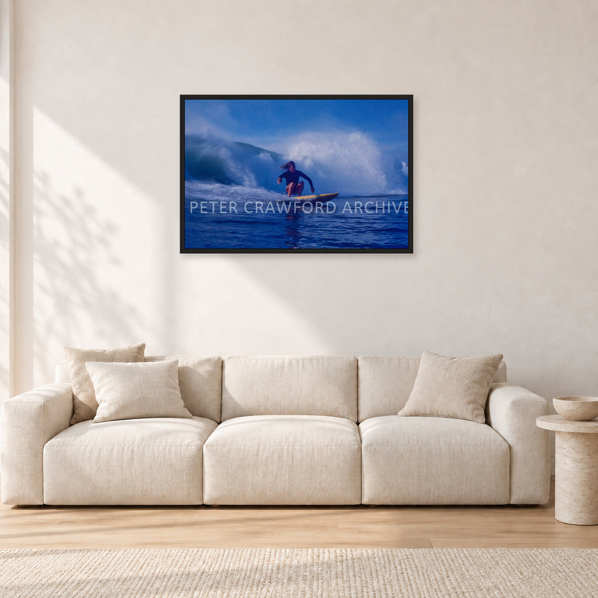Angourie Point, Yamba 1976 by Peter Crawford — 90 × 60 cm, black frame, shown in a light minimalist living room.