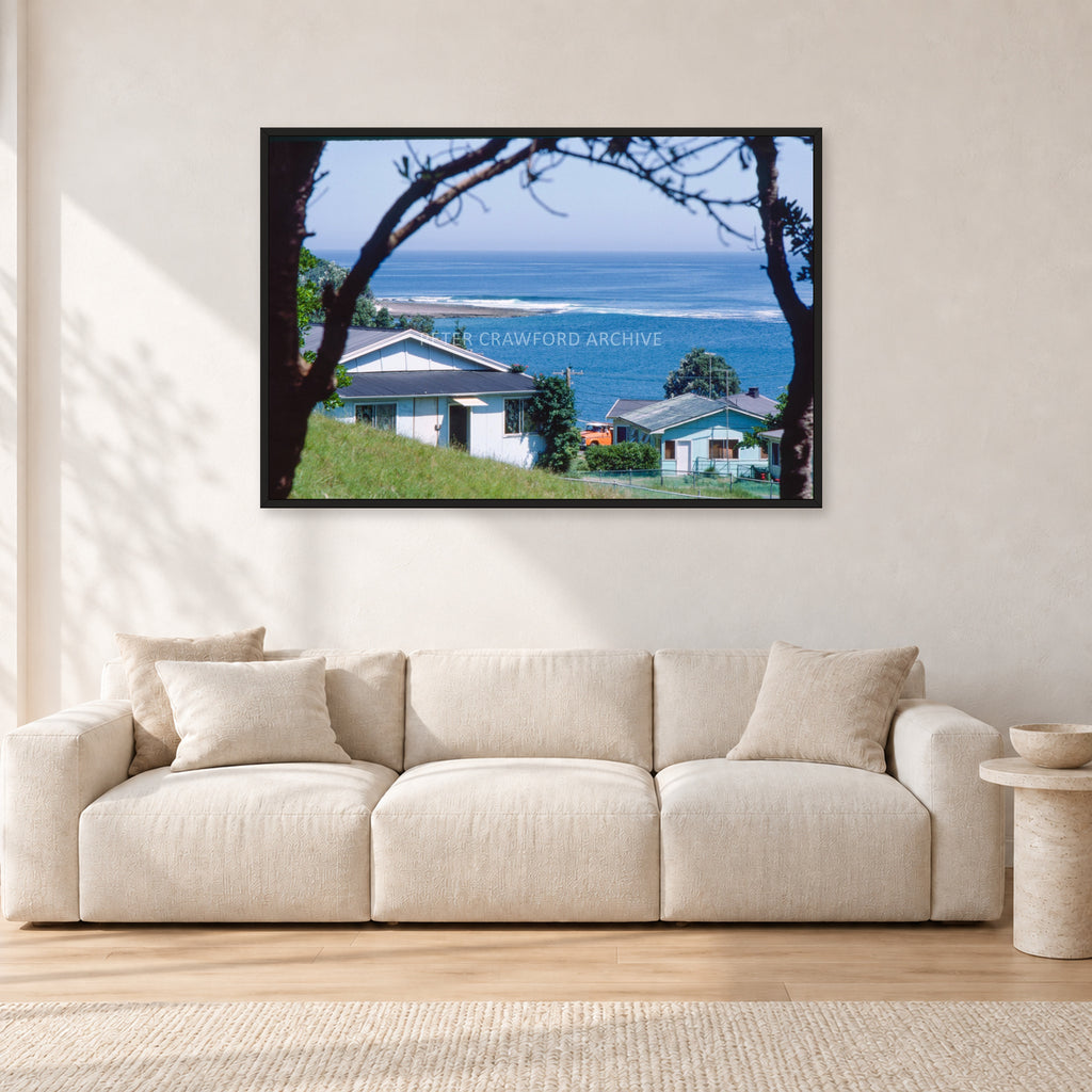 Aussie Pipe by Peter Crawford — 120 × 80 cm, black frame, shown in a light minimalist living room.