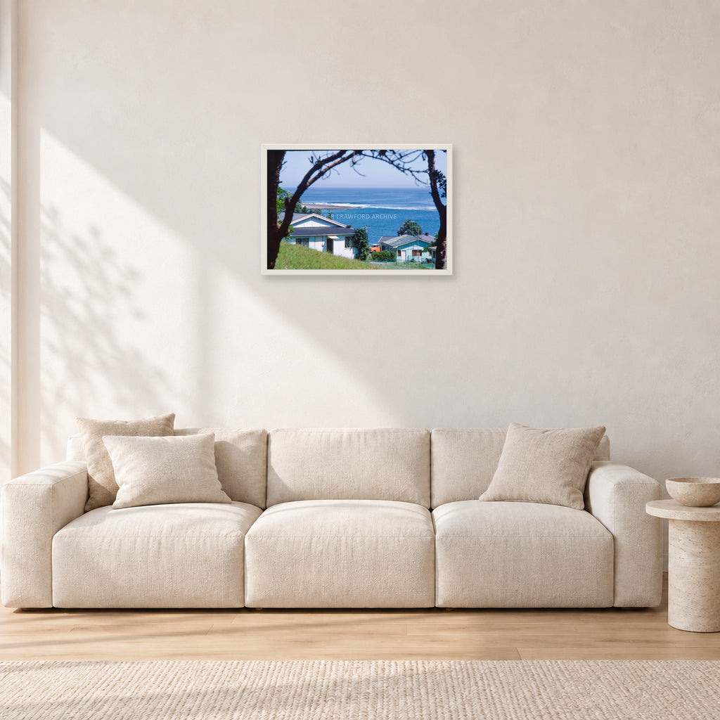 Aussie Pipe by Peter Crawford — 60 × 40 cm, white frame, shown in a light minimalist living room.
