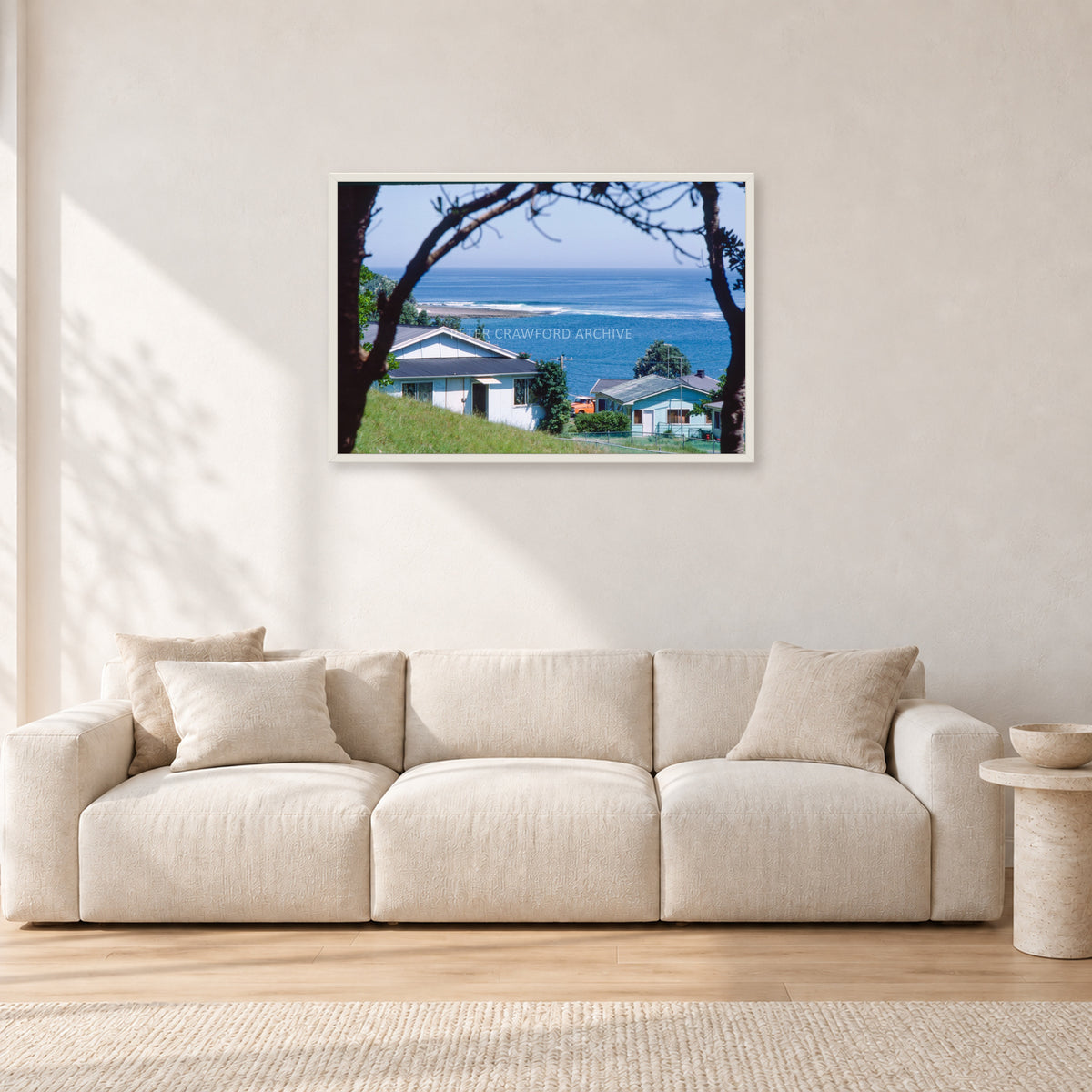 Aussie Pipe by Peter Crawford — 90 × 60 cm, white frame, shown in a light minimalist living room.