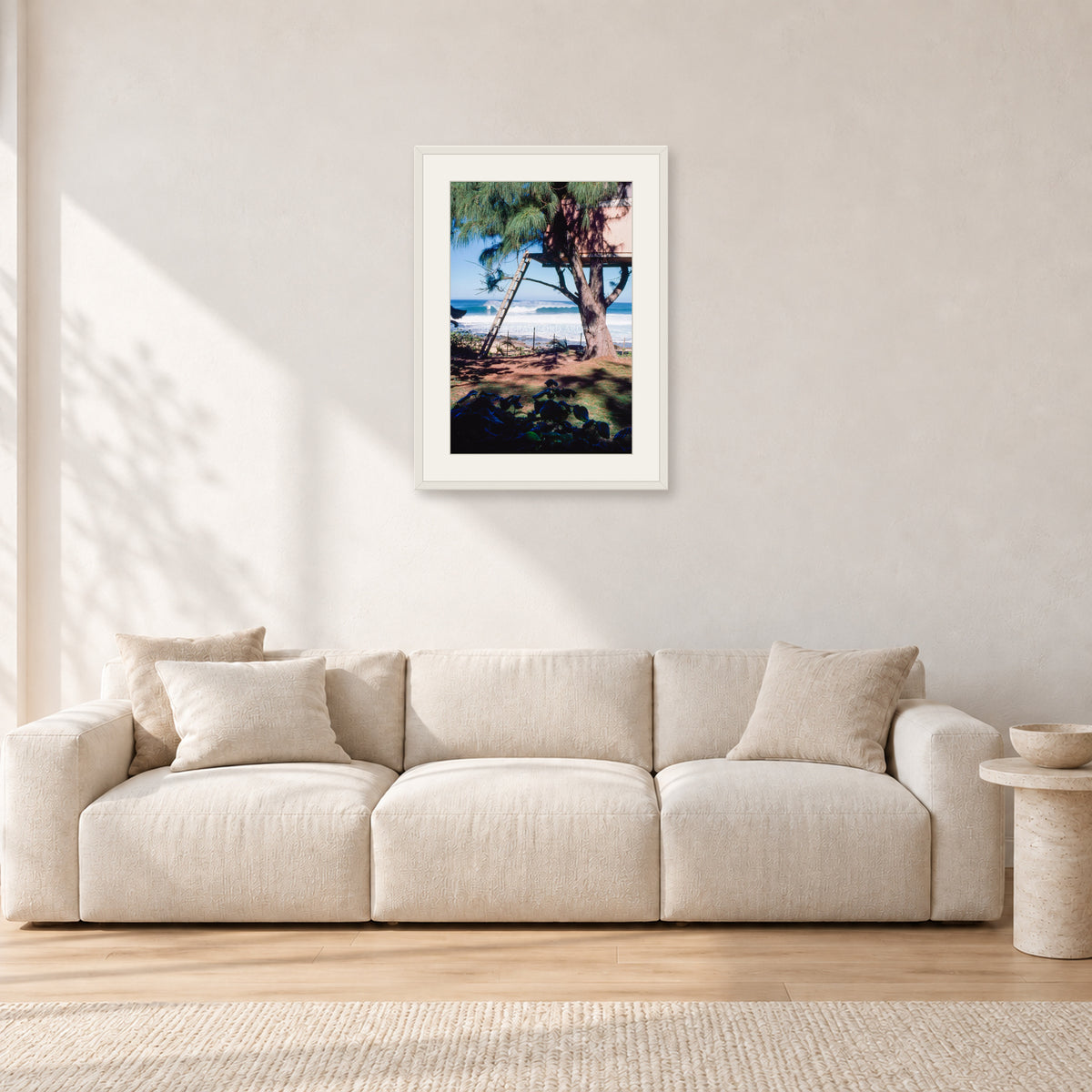 Backdoor Pipeline Tree House by Peter Crawford — 40 × 60 cm, white frame with white mat, shown in a light minimalist living room.