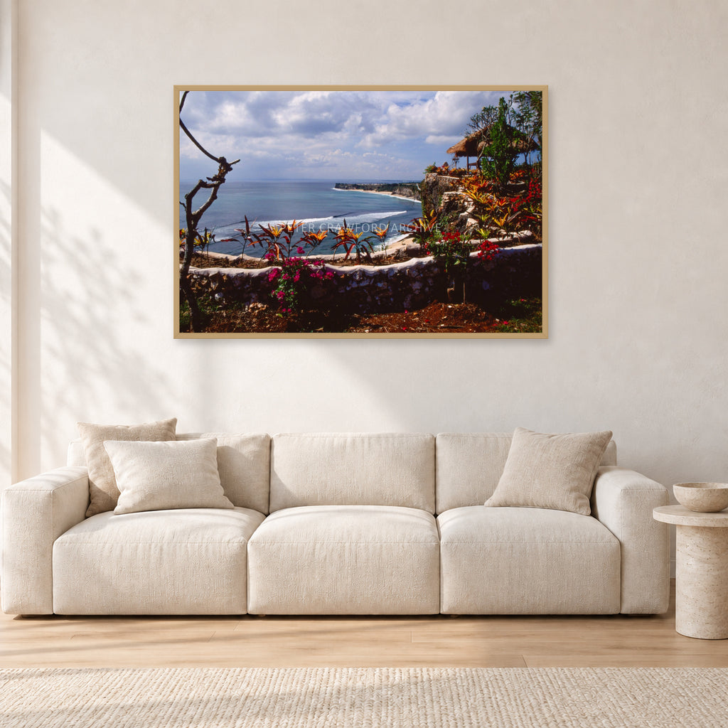 Bali, Peter Crawford by Peter Crawford — 120 × 80 cm, hayseed frame, shown in a light minimalist living room.