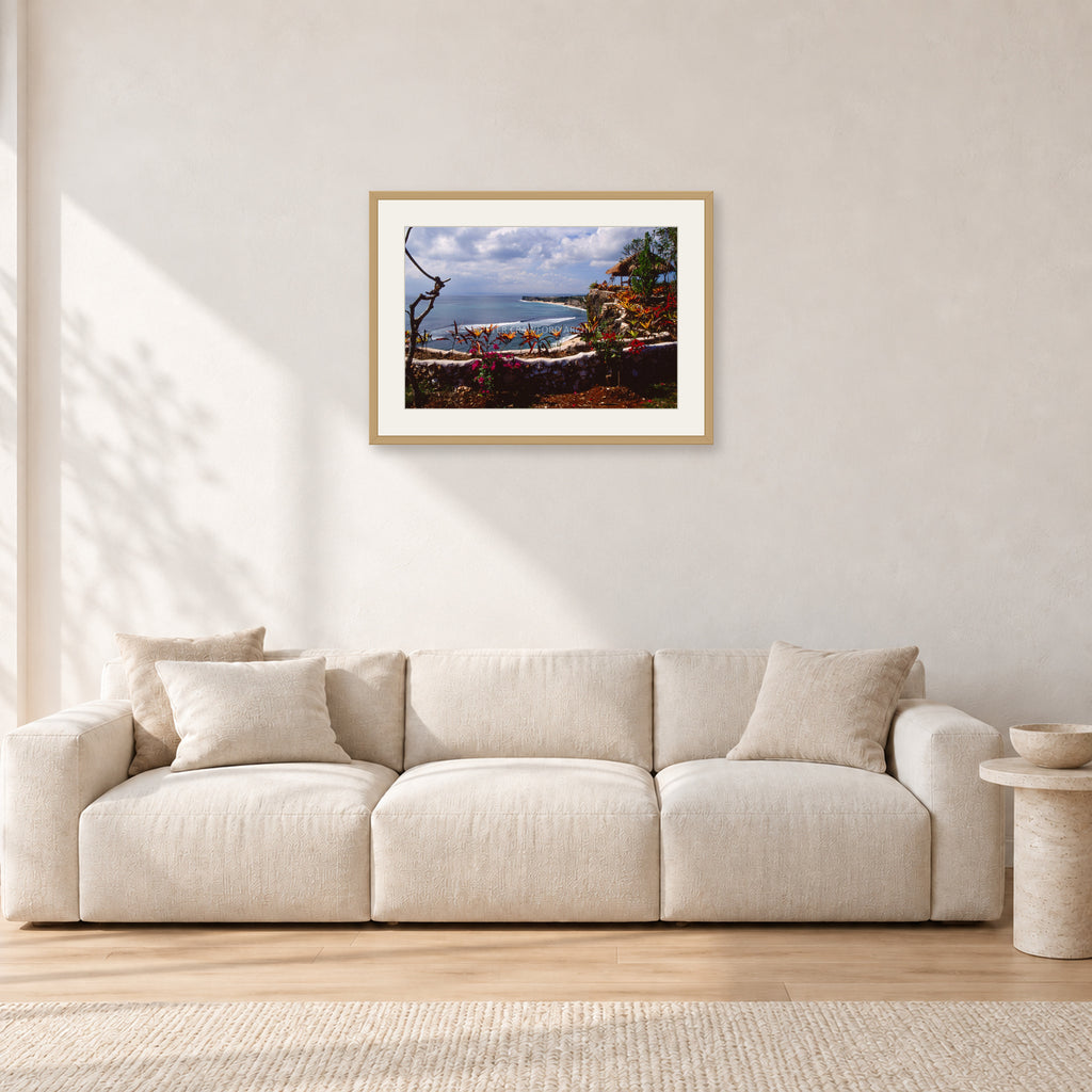 Bali, Peter Crawford by Peter Crawford — 60 × 40 cm, hayseed frame with white mat, shown in a light minimalist living room.
