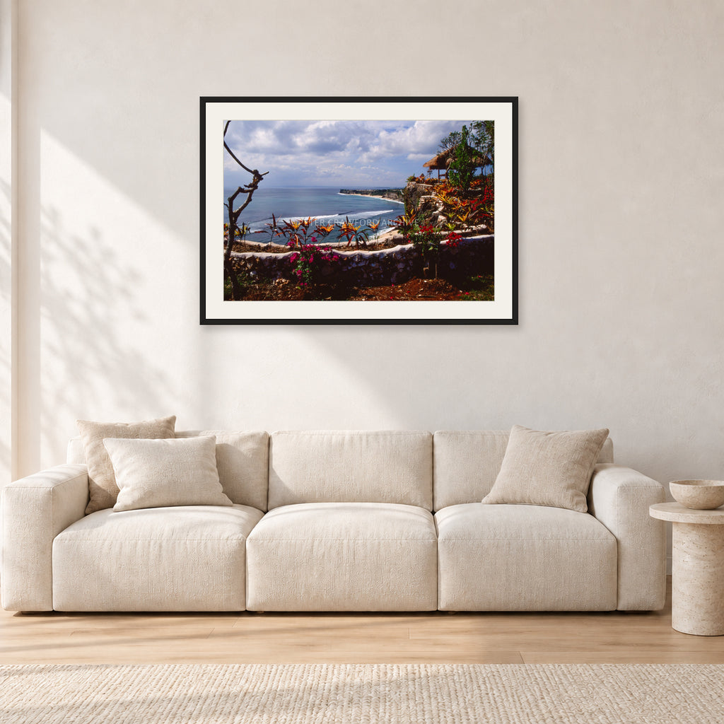 Bali, Peter Crawford by Peter Crawford — 90 × 60 cm, black frame with white mat, shown in a light minimalist living room.