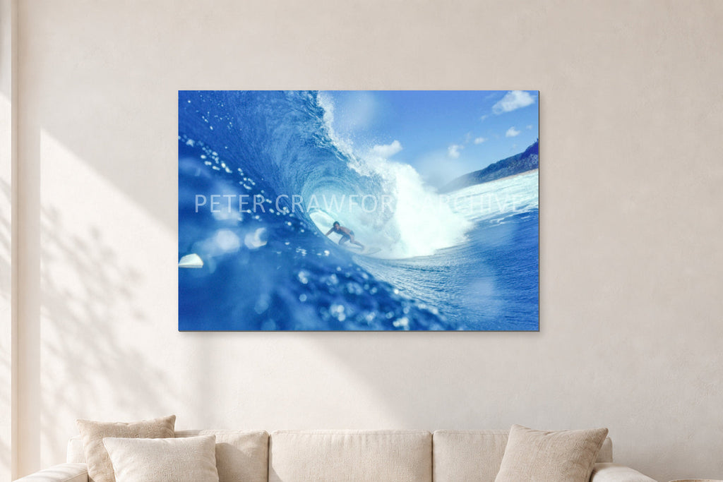 Banzai Pipeline, Hawaii 1976 by Peter Crawford — 120 × 80 cm, aluminium-mounted resin print, shown in a light minimalist living room.