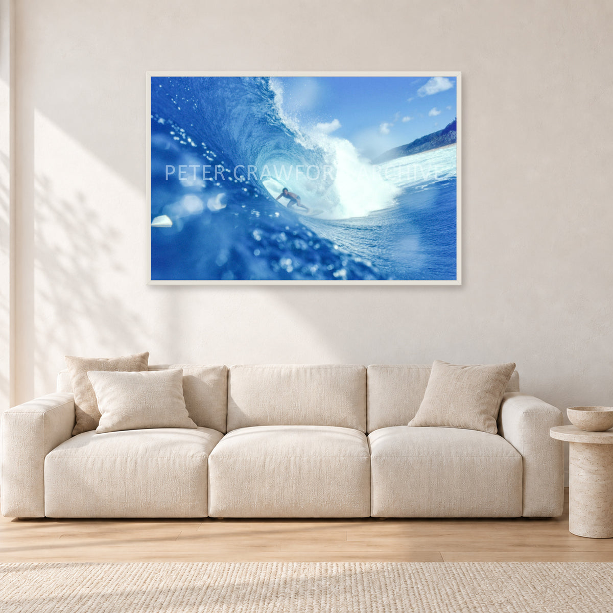 Banzai Pipeline, Hawaii 1976 by Peter Crawford — 120 × 80 cm, white frame, shown in a light minimalist living room.