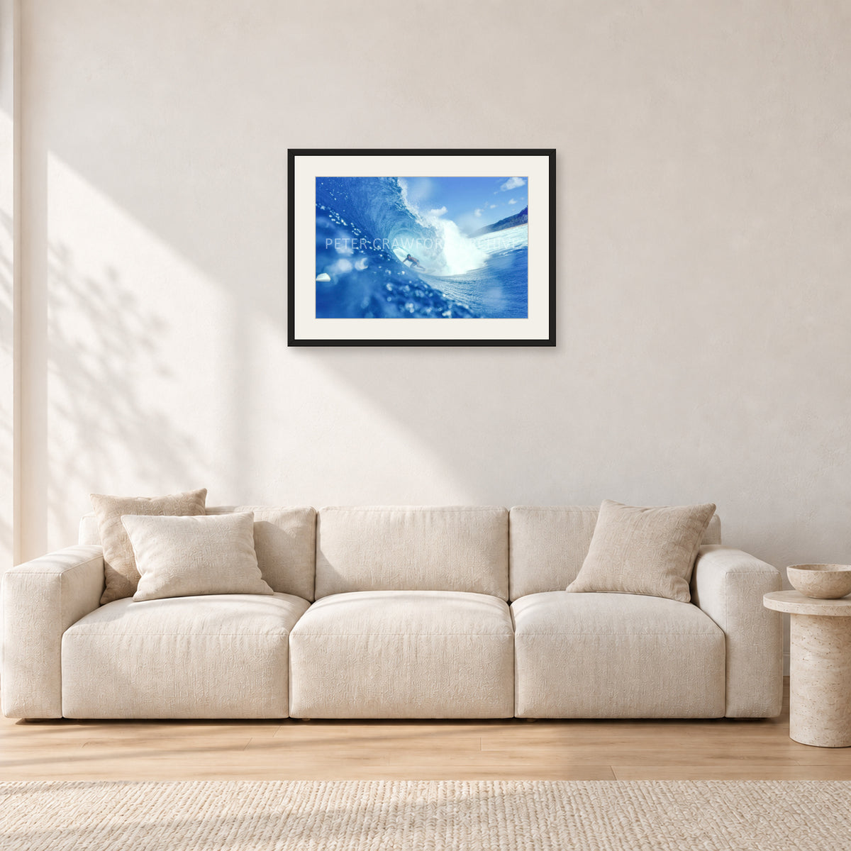 Banzai Pipeline, Hawaii 1976 by Peter Crawford — 60 × 40 cm, black frame with white mat, shown in a light minimalist living room.