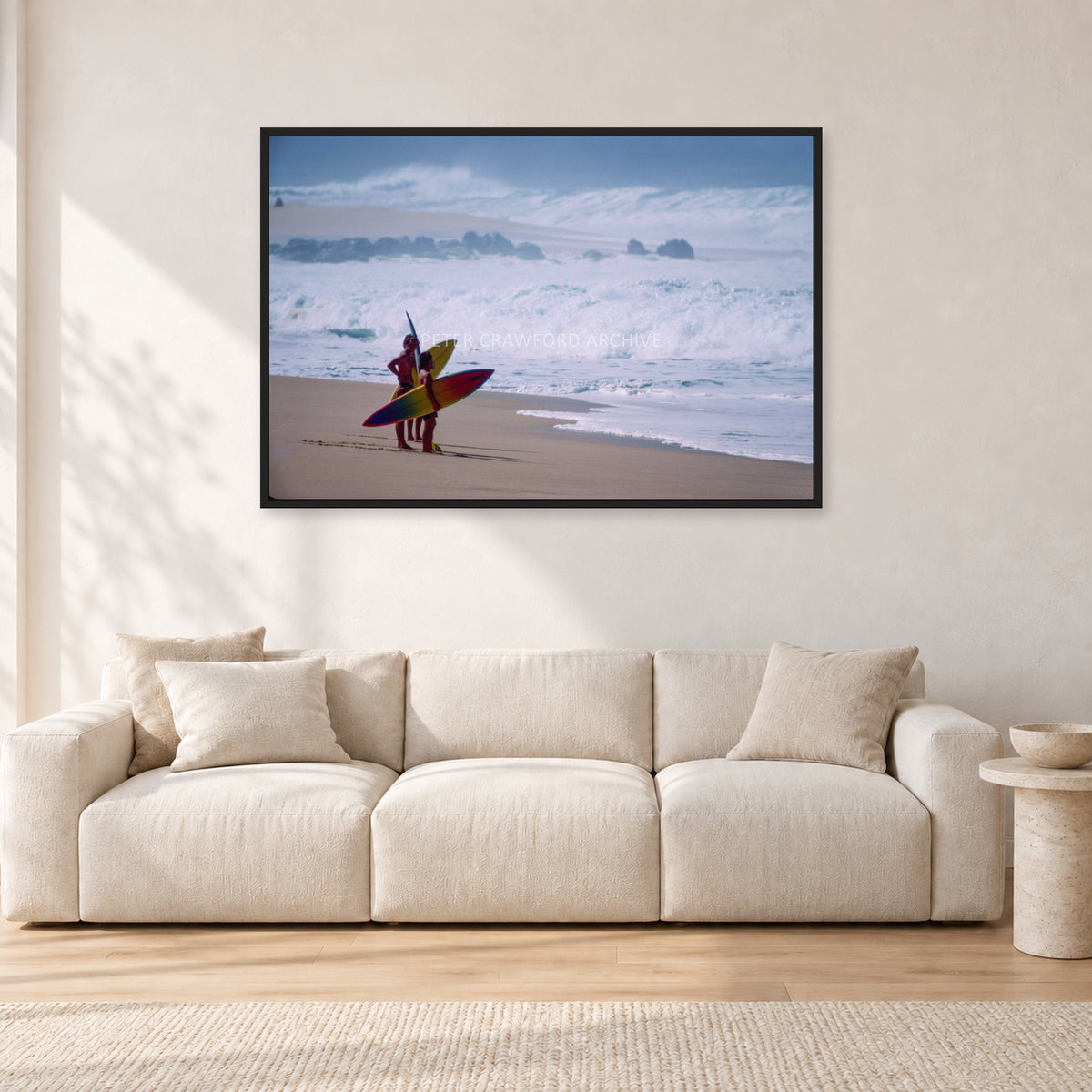 Beach Scene, Peter Crawford by Peter Crawford — 120 × 80 cm, black frame, shown in a light minimalist living room.