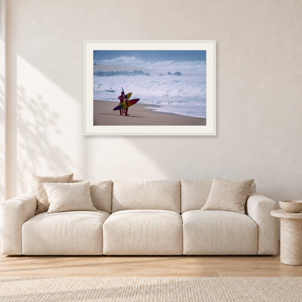 Beach Scene, Peter Crawford by Peter Crawford — 90 × 60 cm, white frame with white mat, shown in a light minimalist living room.