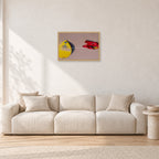 Bells Beach Overview, 1983 by Peter Crawford — 60 × 40 cm, hayseed frame, shown in a light minimalist living room.