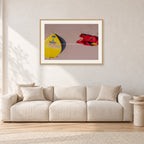 Bells Beach Overview, 1983 by Peter Crawford — 90 × 60 cm, hayseed frame with white mat, shown in a light minimalist living room.