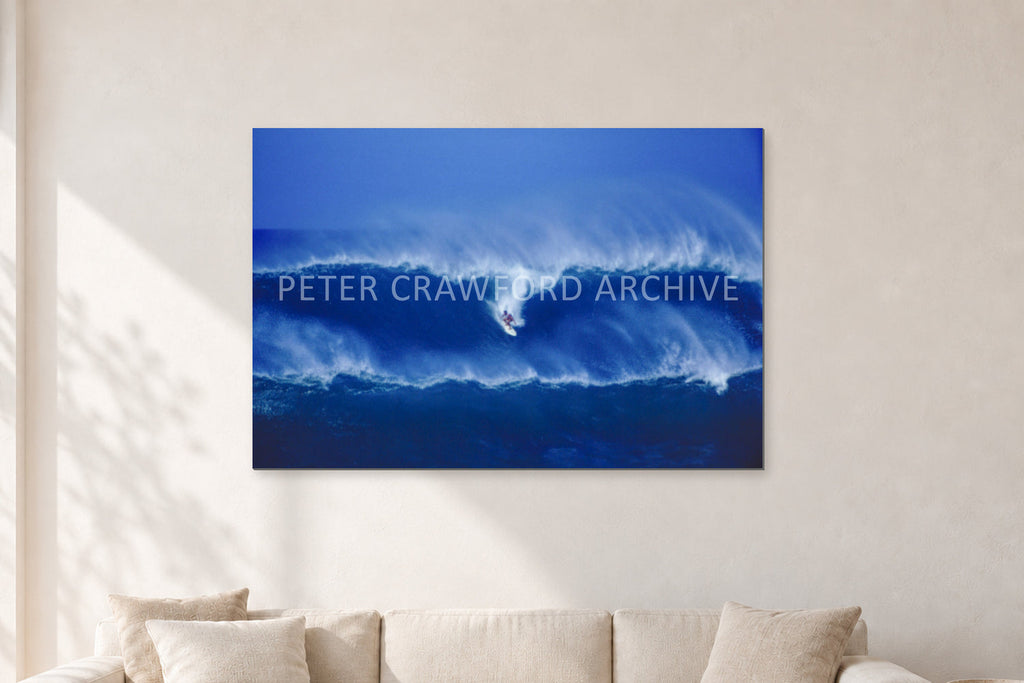 Big Sunset, Unknown Surfer by Peter Crawford — 120 × 80 cm, aluminium-mounted resin print, shown in a light minimalist living room.