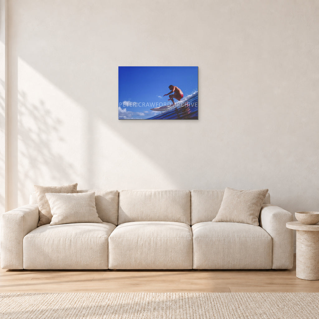 Bruce Raymond, 1976 by Peter Crawford — 60 × 40 cm, aluminium-mounted resin print, shown in a light minimalist living room.