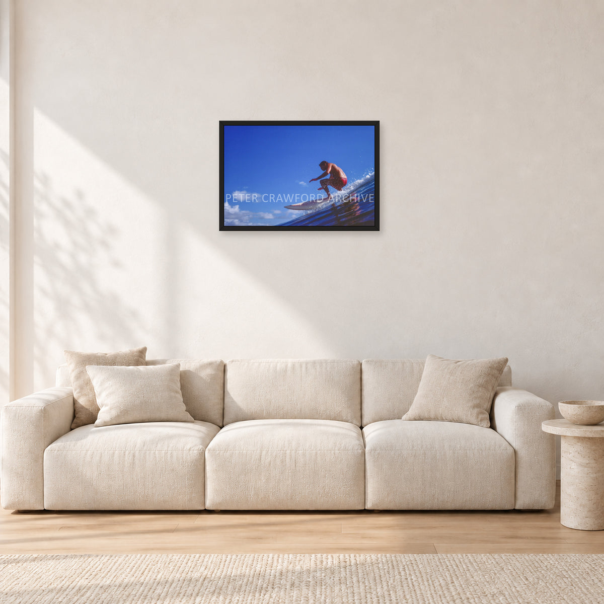 Bruce Raymond, 1976 by Peter Crawford — 60 × 40 cm, black frame, shown in a light minimalist living room.