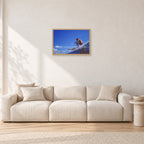 Bruce Raymond, 1976 by Peter Crawford — 60 × 40 cm, hayseed frame, shown in a light minimalist living room.