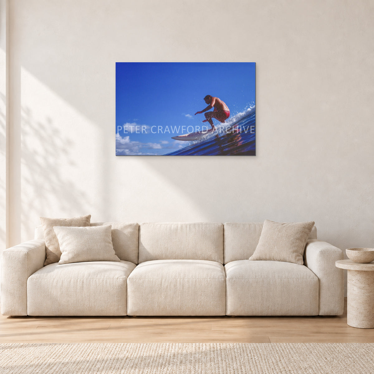 Bruce Raymond, 1976 by Peter Crawford — 90 × 60 cm, aluminium-mounted resin print, shown in a light minimalist living room.