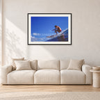 Bruce Raymond, 1976 by Peter Crawford — 90 × 60 cm, black frame with white mat, shown in a light minimalist living room.