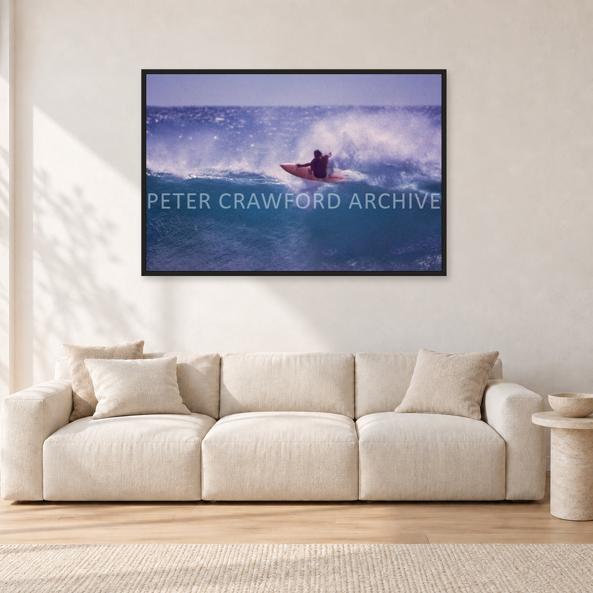 Bruce Raymond, Stubbies 1980 by Peter Crawford — 120 × 80 cm, black frame, shown in a light minimalist living room.