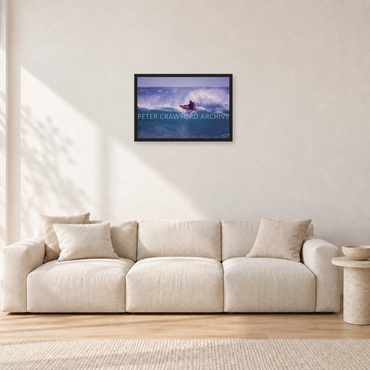 Bruce Raymond, Stubbies 1980 by Peter Crawford — 60 × 40 cm, black frame, shown in a light minimalist living room.