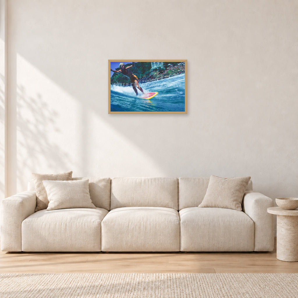 Cheyne Horan, Stubbies 1978 by Peter Crawford — 60 × 40 cm, hayseed frame, shown in a light minimalist living room.