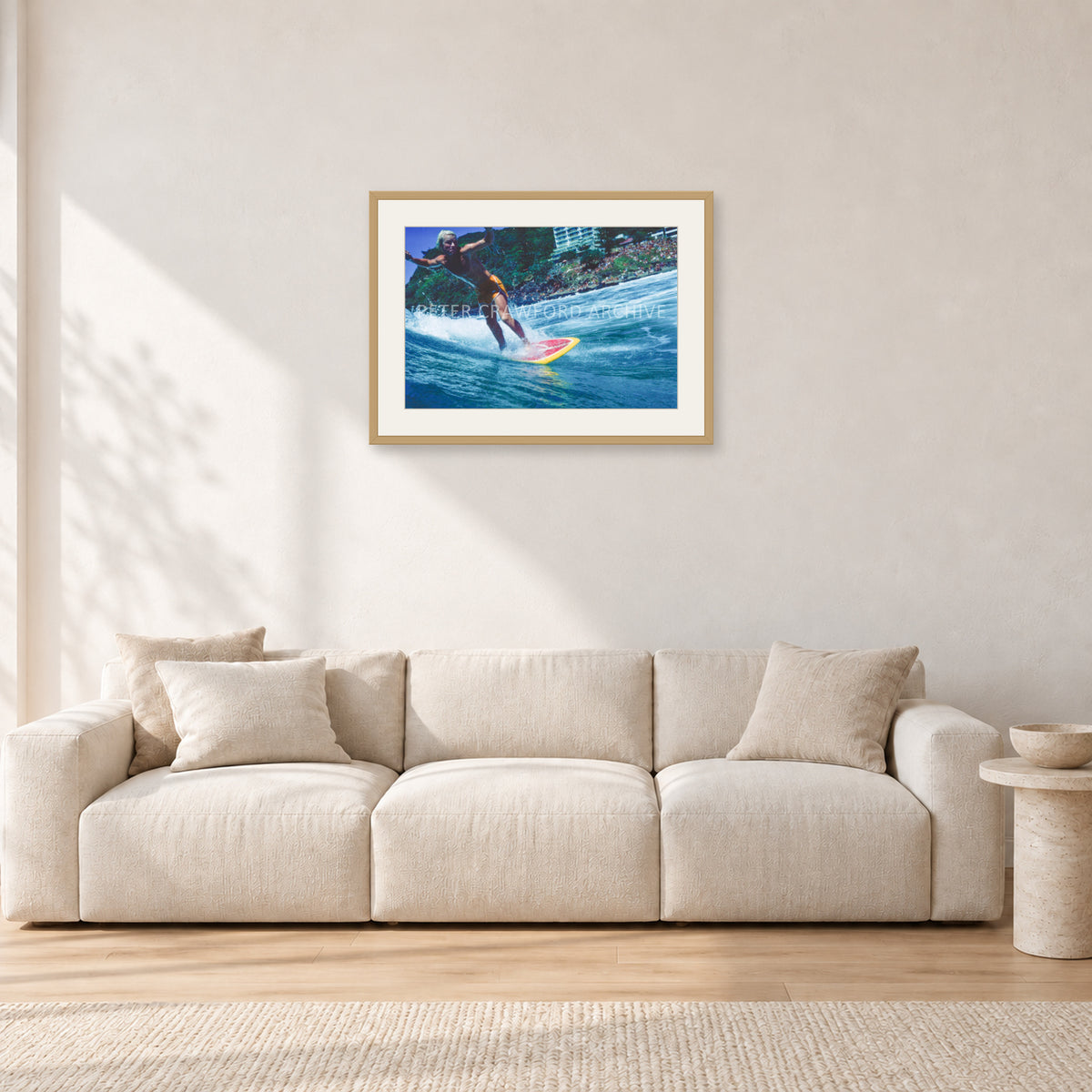 Cheyne Horan, Stubbies 1978 by Peter Crawford — 60 × 40 cm, hayseed frame with white mat, shown in a light minimalist living room.