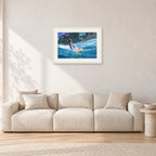 Cheyne Horan, Stubbies 1978 by Peter Crawford — 60 × 40 cm, white frame with white mat, shown in a light minimalist living room.