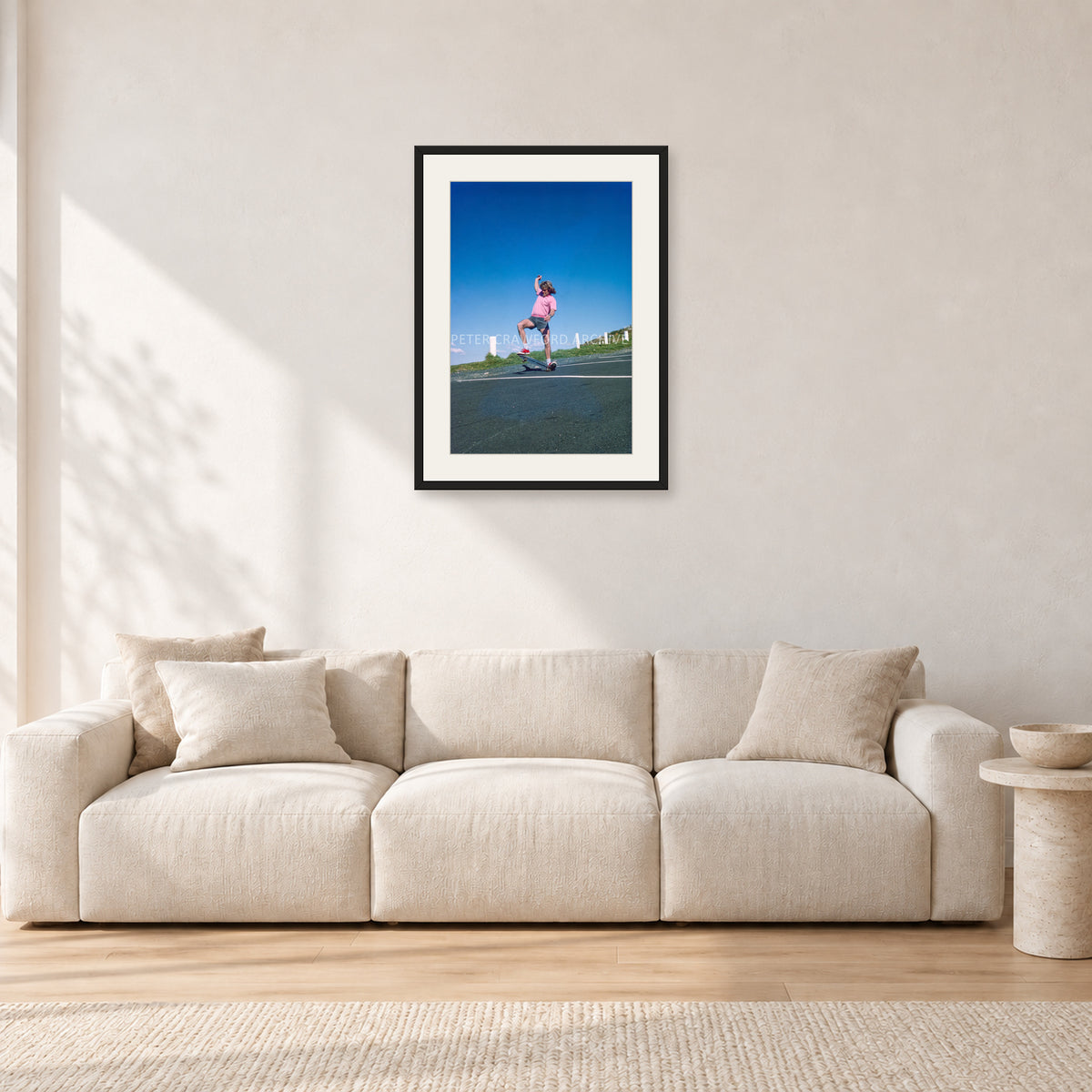 Col Smith DY 1977 by Peter Crawford — 40 × 60 cm, black frame with white mat, shown in a light minimalist living room.