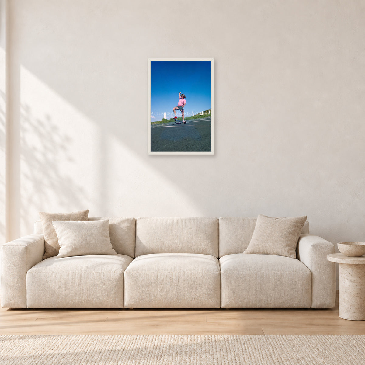 Col Smith DY 1977 by Peter Crawford — 40 × 60 cm, white frame, shown in a light minimalist living room.