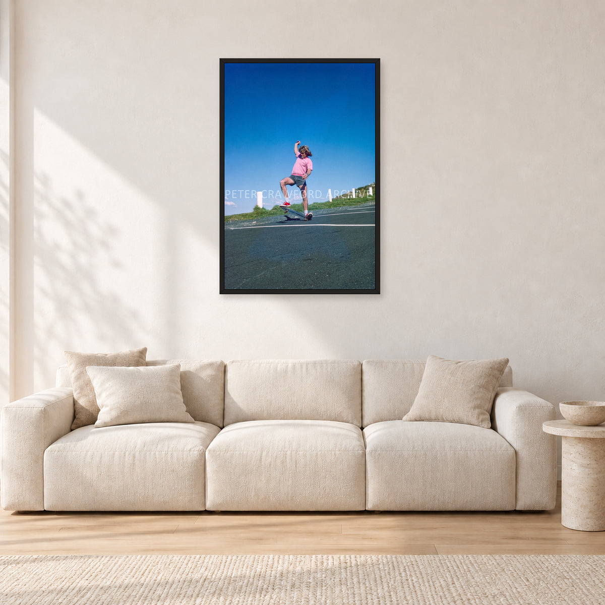 Col Smith DY 1977 by Peter Crawford — 60 × 90 cm, black frame, shown in a light minimalist living room.
