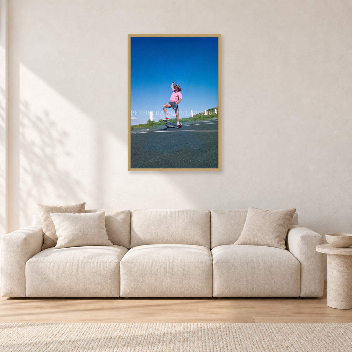 Col Smith DY 1977 by Peter Crawford — 60 × 90 cm, hayseed frame, shown in a light minimalist living room.