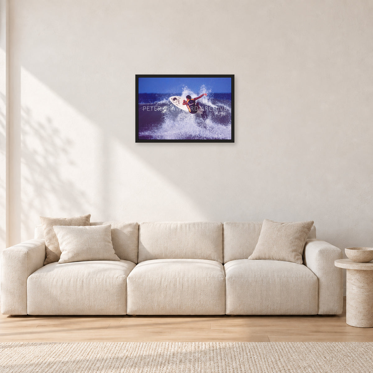 Dane Kealoha, Off The Wall 1977 by Peter Crawford — 60 × 40 cm, black frame, shown in a light minimalist living room.