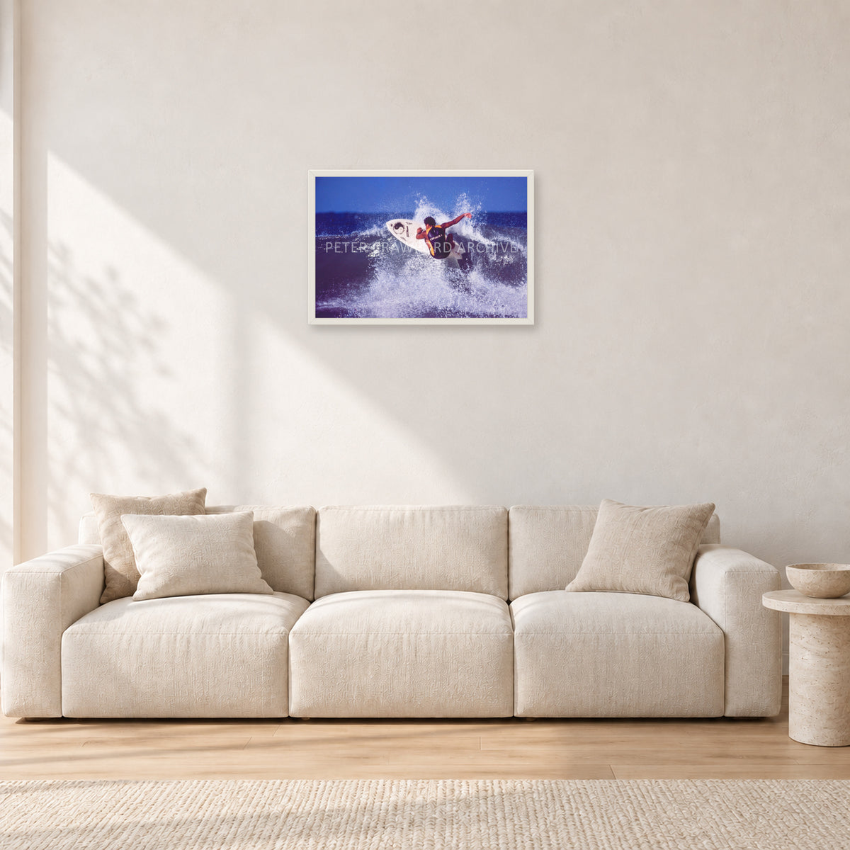 Dane Kealoha, Off The Wall 1977 by Peter Crawford — 60 × 40 cm, white frame, shown in a light minimalist living room.