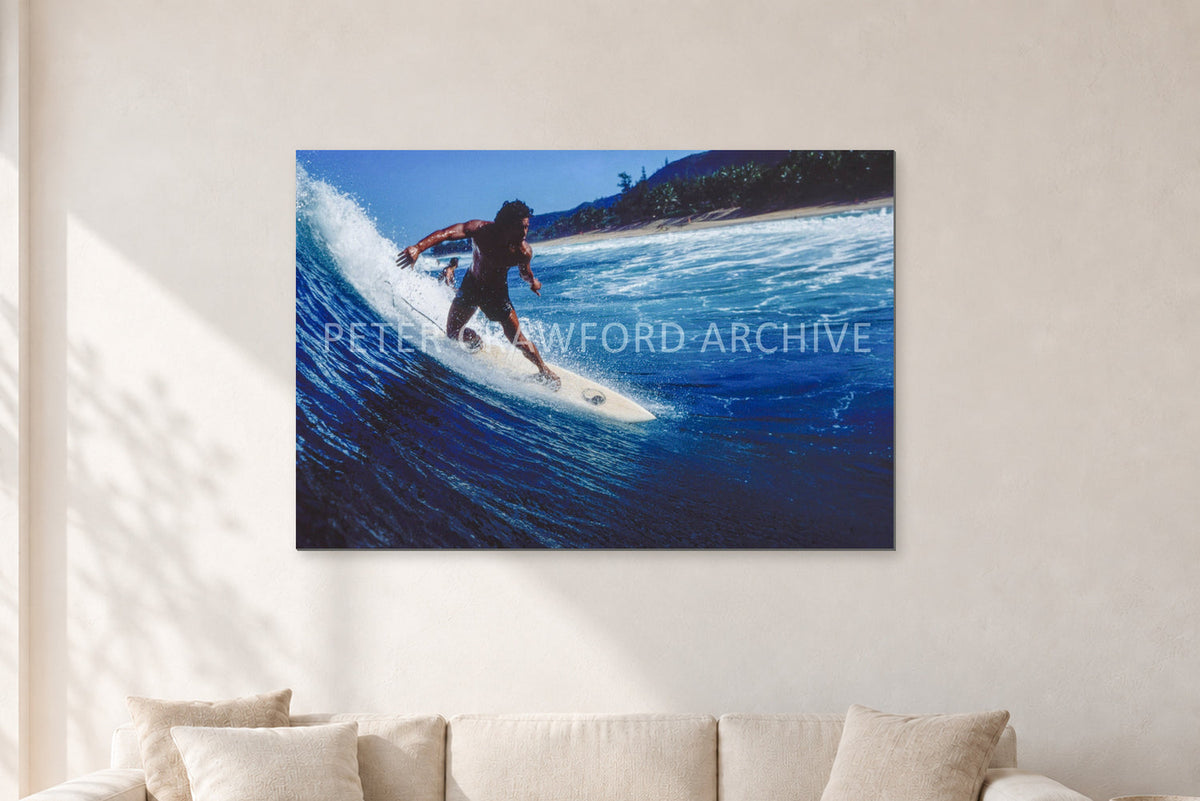 Dane Kealoha, Off The Wall 1978 by Peter Crawford — 120 × 80 cm, aluminium-mounted resin print, shown in a light minimalist living room.