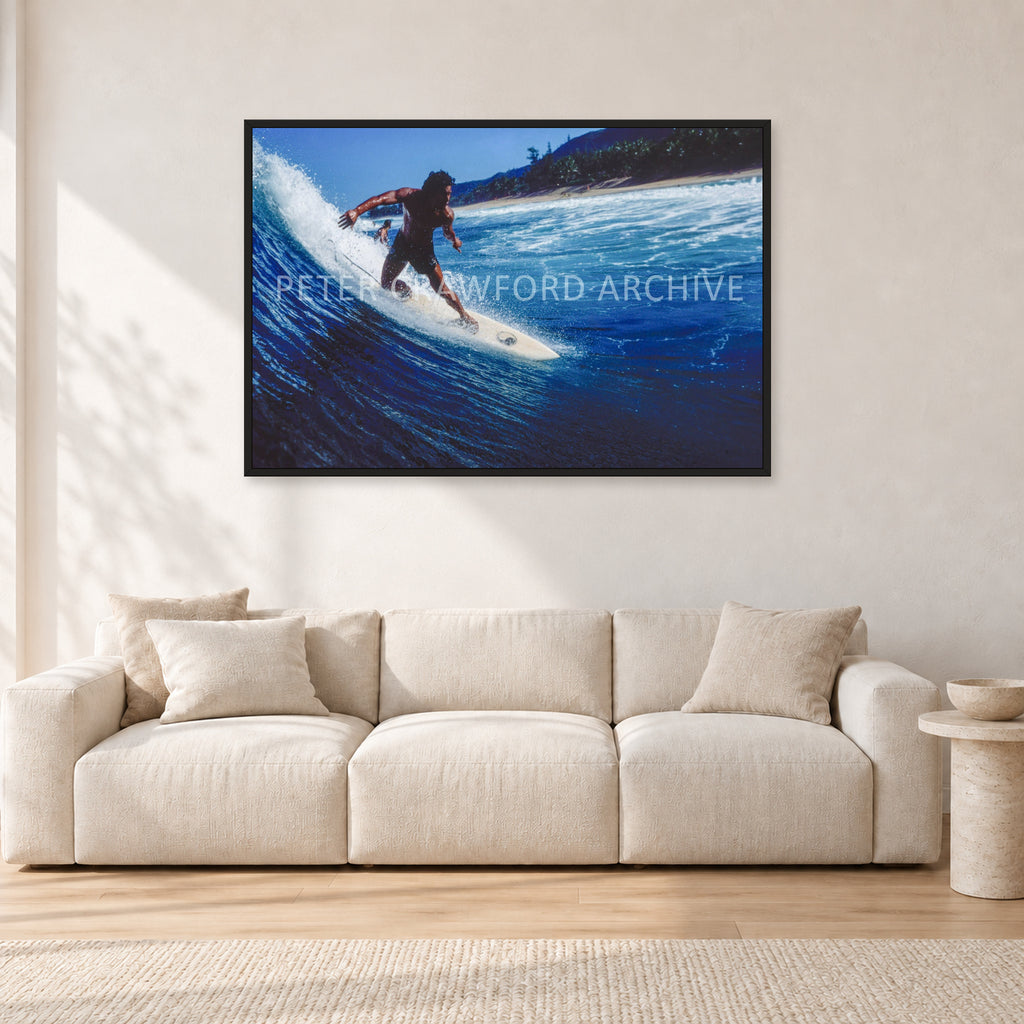Dane Kealoha, Off The Wall 1978 by Peter Crawford — 120 × 80 cm, black frame, shown in a light minimalist living room.